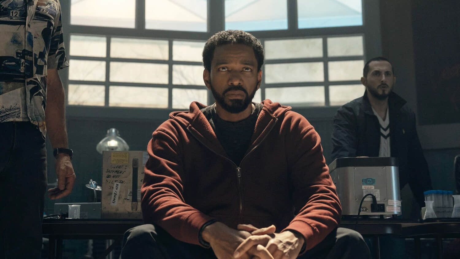 laz-alonso-as-mm-in-the-boys-sitting-down-looking-miserable-in-the-boys-season-5.jpeg