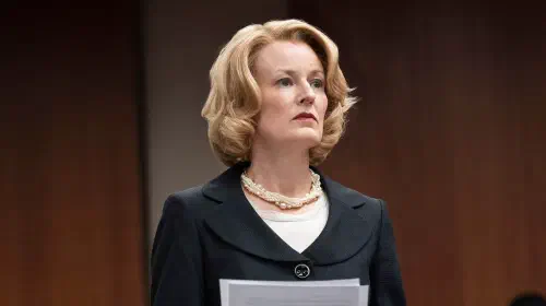 assets/rosemarie-dewitt-standing-up-in-court-in-hbo-s-the-staircase.jpeg