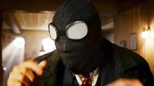 assets/ben-reilly-with-a-mask-on-in-spider-noir.jpeg