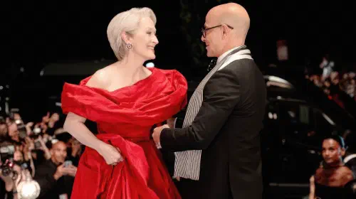 assets/meryl-streep-as-miranda-and-stanley-tucci-as-nigel-greeting-one-another-at-a-gala-in-the-devil-wears-prada-2.jpeg