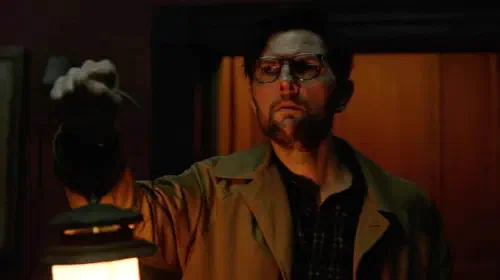 assets/adam-scott-with-a-lantern-in-hokum.jpeg