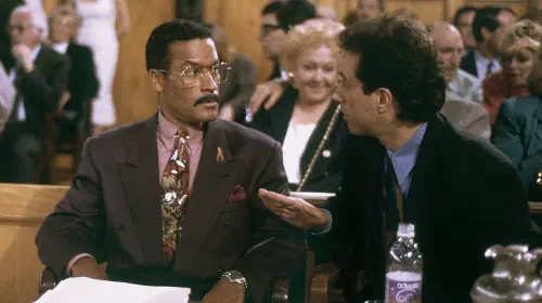 assets/jerry-talks-to-jackie-in-court-in-the-seinfeld-finale.jpeg