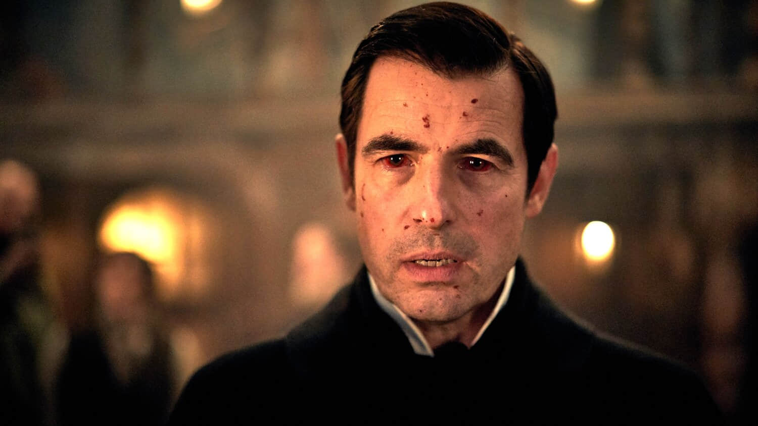 claes-bang-s-dracula-looking-in-thought-with-blood-on-his-face-and-in-his-eyes.jpeg