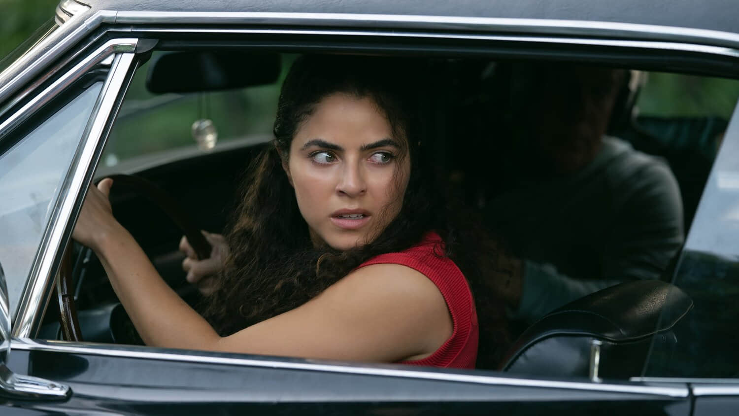 shannon-gisela-s-etta-looking-worriedly-over-her-shoulder-while-in-a-car-in-m-i-a-1.jpeg