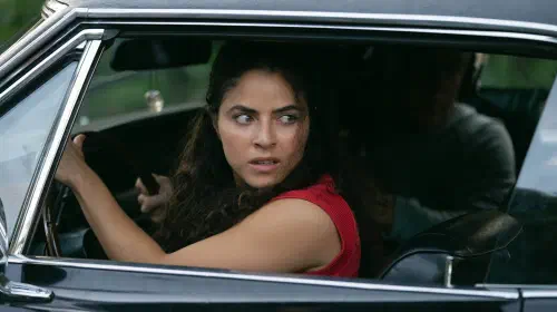 assets/shannon-gisela-s-etta-looking-worriedly-over-her-shoulder-while-in-a-car-in-m-i-a-1.jpeg