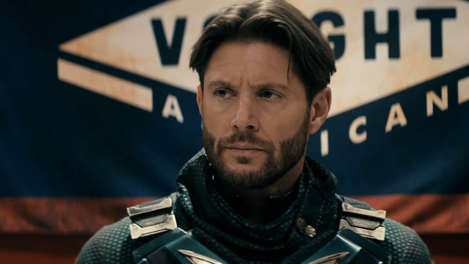 jensen-ackles-as-soldier-boy-in-front-of-a-vought-sign-in-the-boys.jpeg