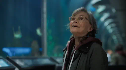 assets/sally-field-as-tova-looking-up-in-an-aquarium-in-remarkably-bright-creatures.jpeg