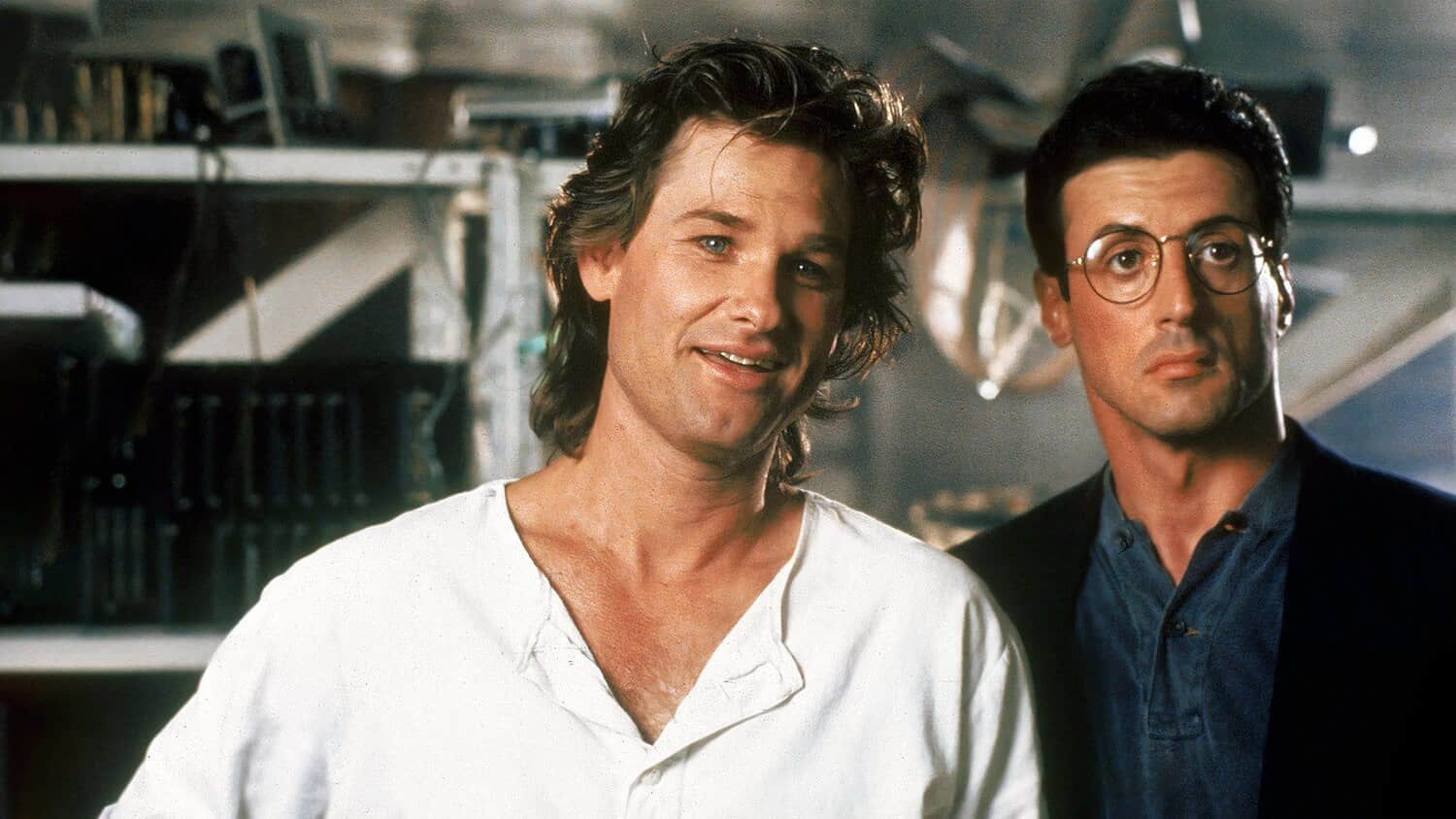 kurt-russell-smiling-and-sylvester-stallone-looking-bemused-in-tango-cash.jpeg