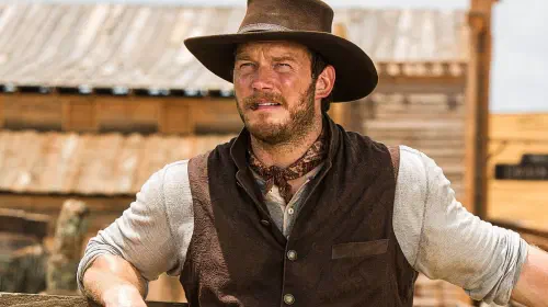 assets/chris-pratt-with-a-cigar-on-his-mouth-in-the-magnificent-seven.jpeg