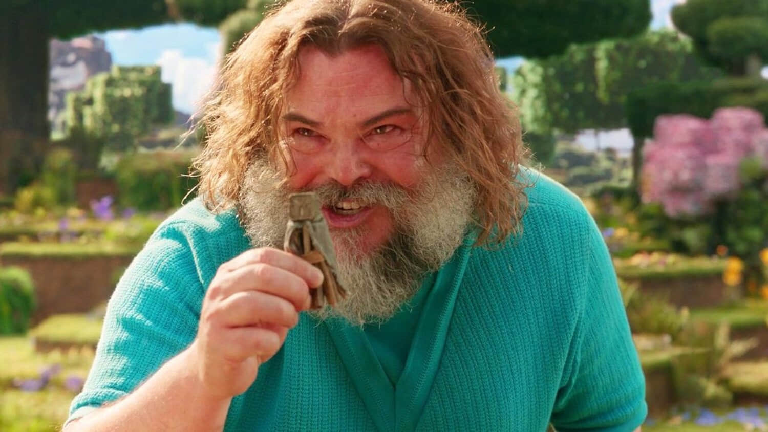 jack-black-as-steve-excitedly-holding-up-a-small-object-in-a-minecraft-movie-2025.jpeg