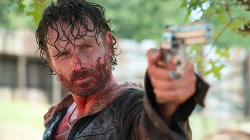 assets/close-up-of-a-sweaty-rick-grimes-wielding-a-handgun-in-the-walking-dead.jpeg