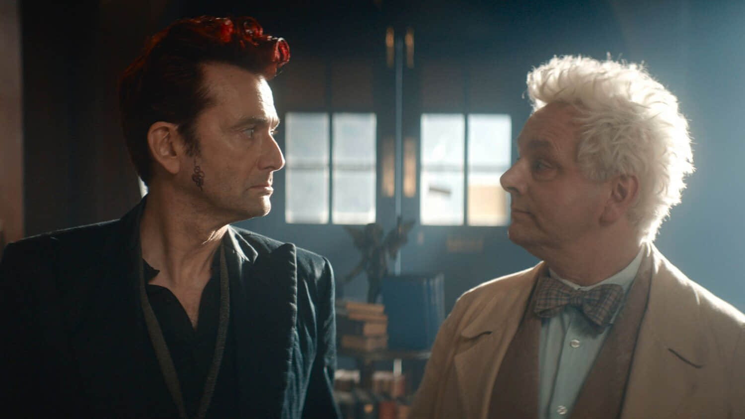crowley-and-aziraphale-looking-at-each-other-in-good-omens-season-3.jpeg