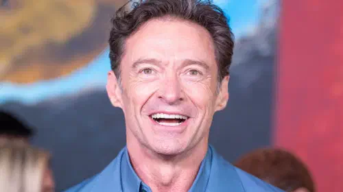 assets/hugh-jackman-smiling-on-the-red-carpet-for-the-sheep-detectives.jpeg