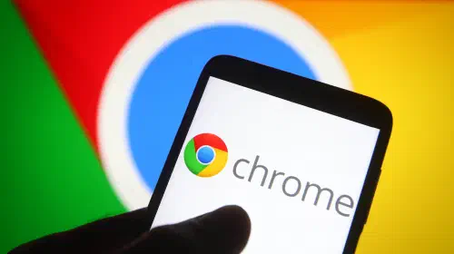 assets/Chrome-logo-on-phone-in-front-of-Chrome-logo-on-screen-1.jpeg