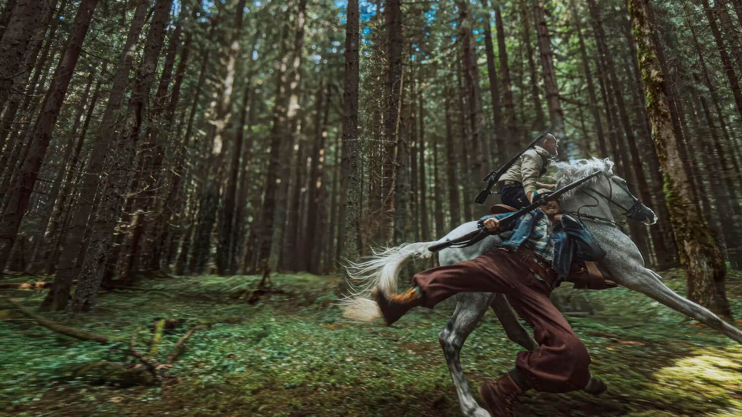 a-person-on-horseback-dragging-another-through-the-woods-in-hope.jpeg