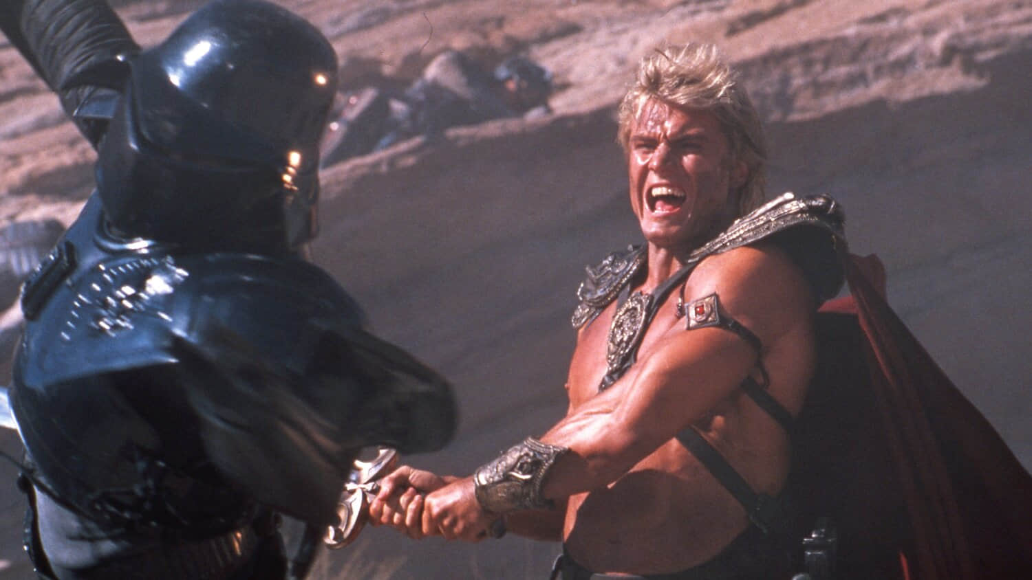dolph-lundgren-swinging-a-sword-in-1987-masters-of-the-universe.jpeg