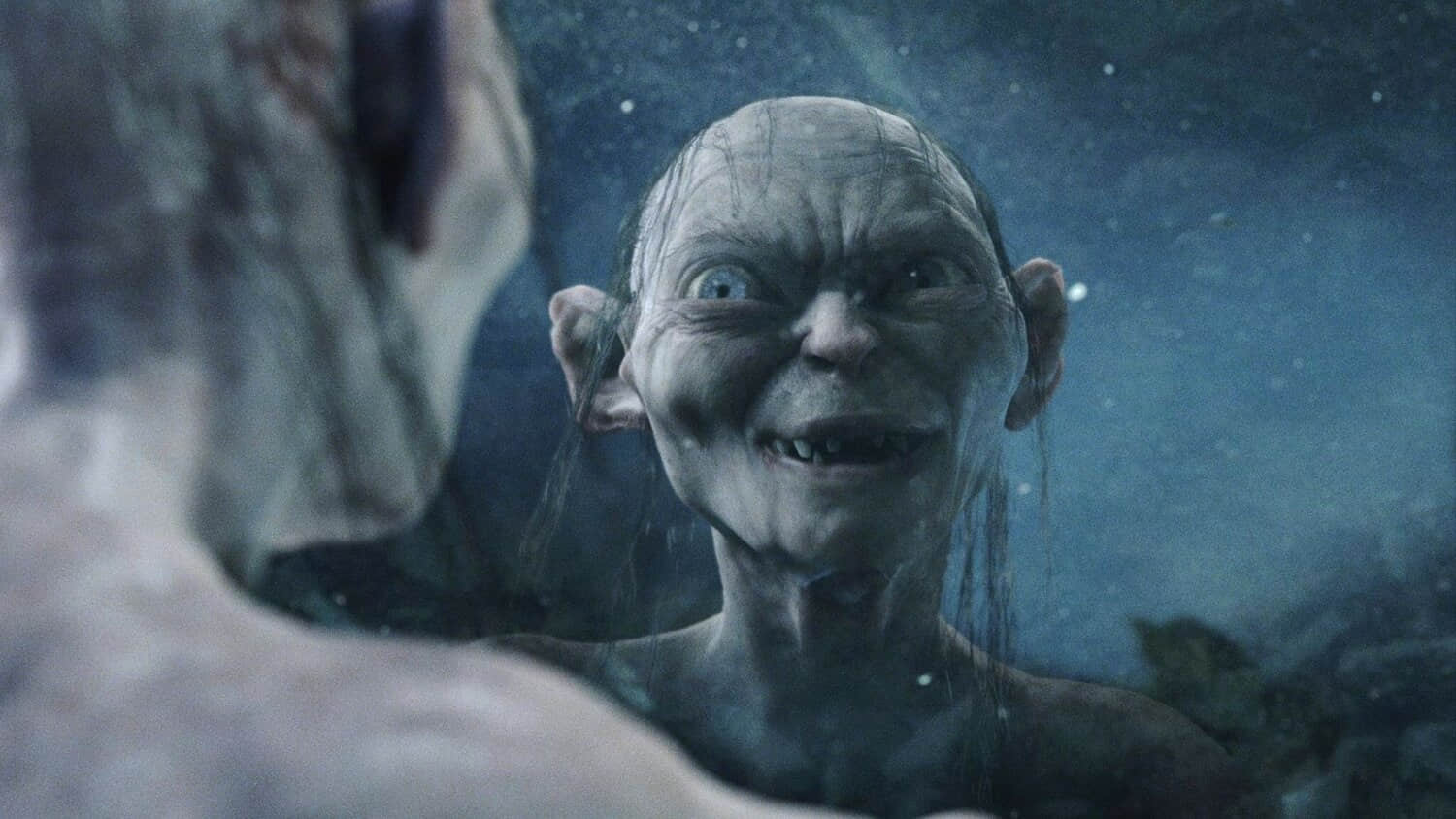 gollum-smiling-at-smeagol-through-his-reflection-in-the-lord-of-the-rings-the-return-of-the-king.jpeg