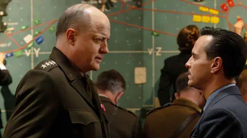 assets/brendan-fraser-as-dwight-eisenhower-and-andrew-scott-as-james-stagg-facing-each-other-in-pressure.jpeg