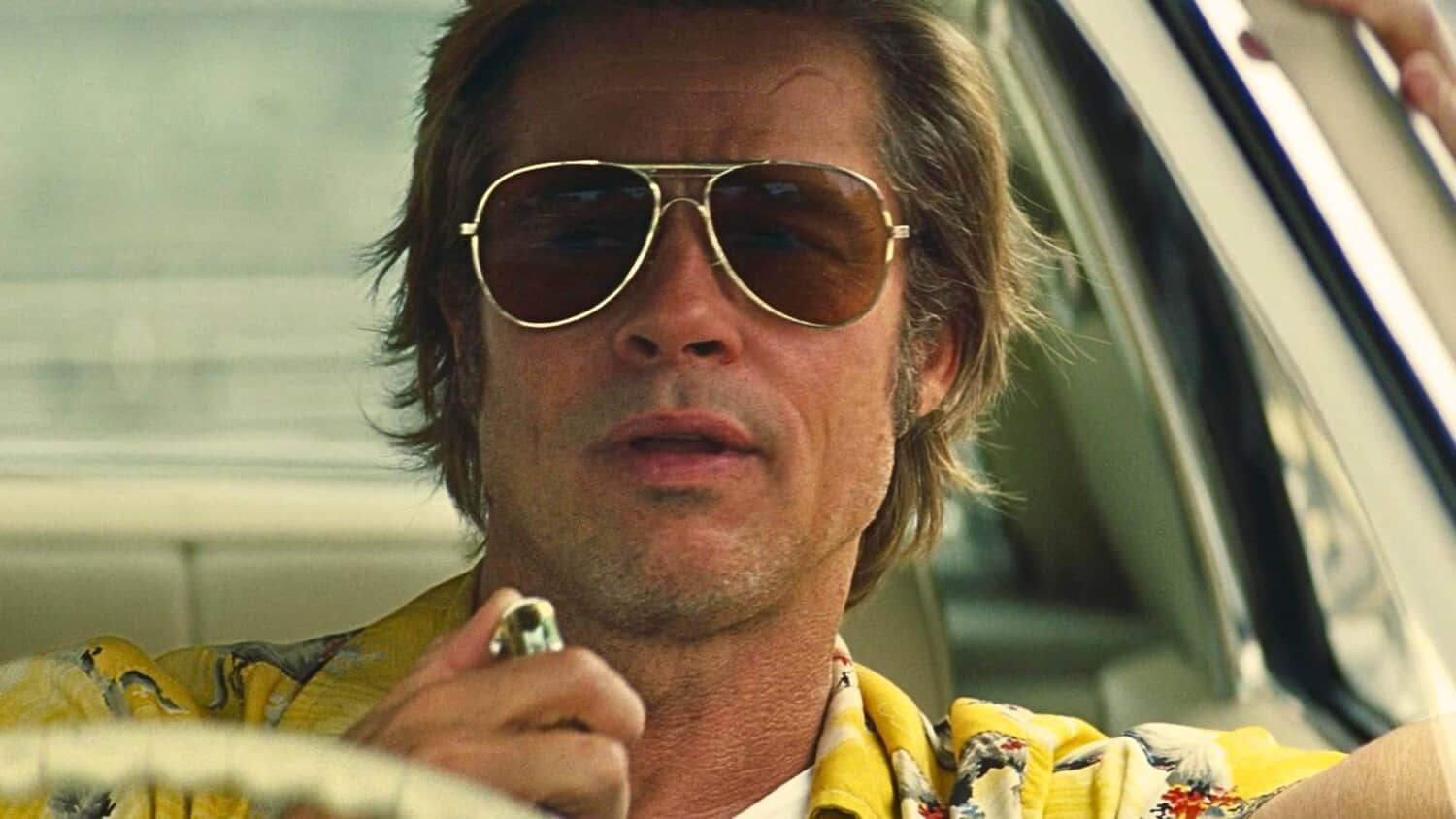 brad-pitt-as-cliff-booth-driving-car-in-once-upon-a-time-in-hollywood.jpeg