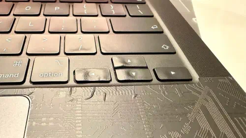 assets/M5-Pro-MacBook-Pro-with-warped-arrow-keys.jpeg