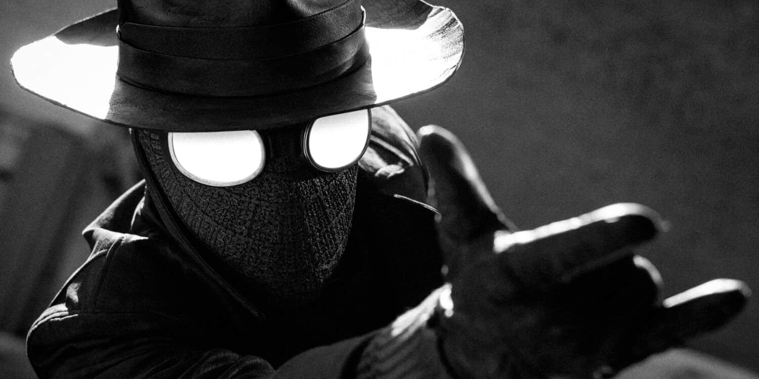 nicolas-cage-as-spider-man-noir-with-his-hand-reached-out-in-spider-noir.jpeg