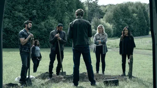 assets/the-boys-gathered-around-frenchie-s-grave-in-the-boys-season-5.jpeg