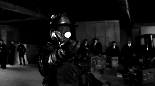 assets/nicolas-cage-s-the-spider-firing-a-web-in-spider-noir.jpeg