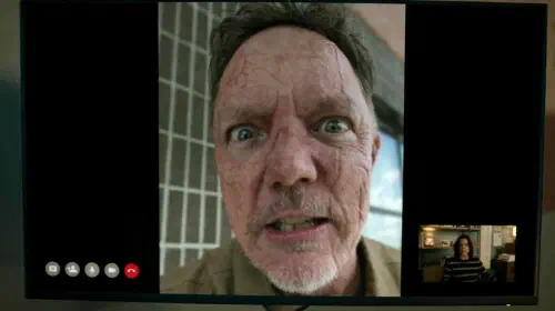 assets/stu-macher-looking-crazy-on-a-screen-in-scream-7.jpeg