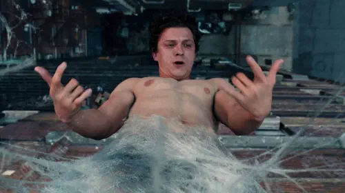 assets/tom-holland-as-peter-parker-freaking-out-while-hanging-in-the-air-webbed-in-spider-man-brand-new-day.jpeg