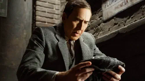 assets/nicolas-cage-holding-his-spider-man-mask-in-final-spider-noir-trailer.jpeg