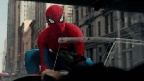 assets/tom-holland-as-spider-man-sitting-on-the-hood-of-punisher-s-truck-in-spider-man-brand-new-day.jpeg