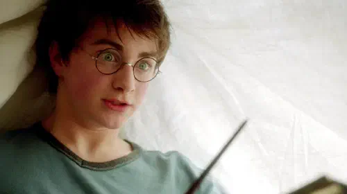 assets/harry-potter-surprised-while-using-lumos-maxima-under-a-blanket-in-prisoner-of-azkaban.jpeg
