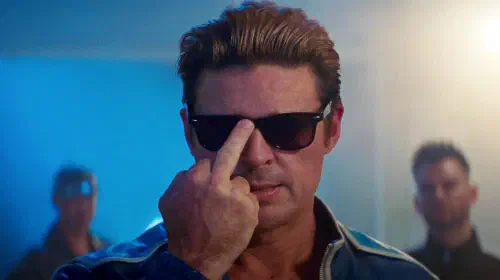 assets/karl-urban-as-johnny-cage-pushing-sunglasses-up-with-his-middle-finger-in-mortal-kombat-ii.jpeg