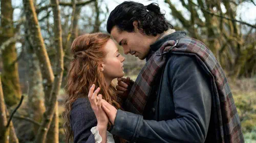 assets/a-couple-embraces-in-outlander-blood-of-my-blood.jpeg