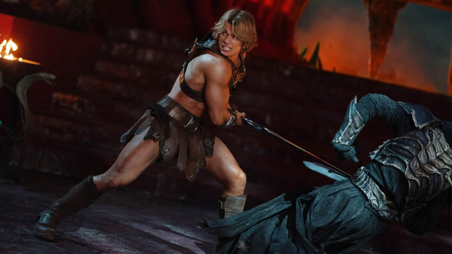 nicholas-galitzine-as-he-man-wields-his-sword-against-a-villain-in-masters-of-the-universe.jpeg