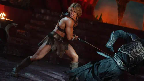 assets/nicholas-galitzine-as-he-man-wields-his-sword-against-a-villain-in-masters-of-the-universe.jpeg