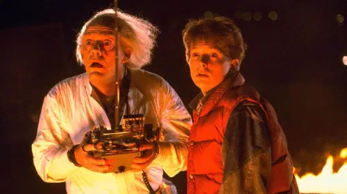 assets/doc-and-morty-look-stunned-and-are-lit-by-flames-in-back-to-the-future.jpeg