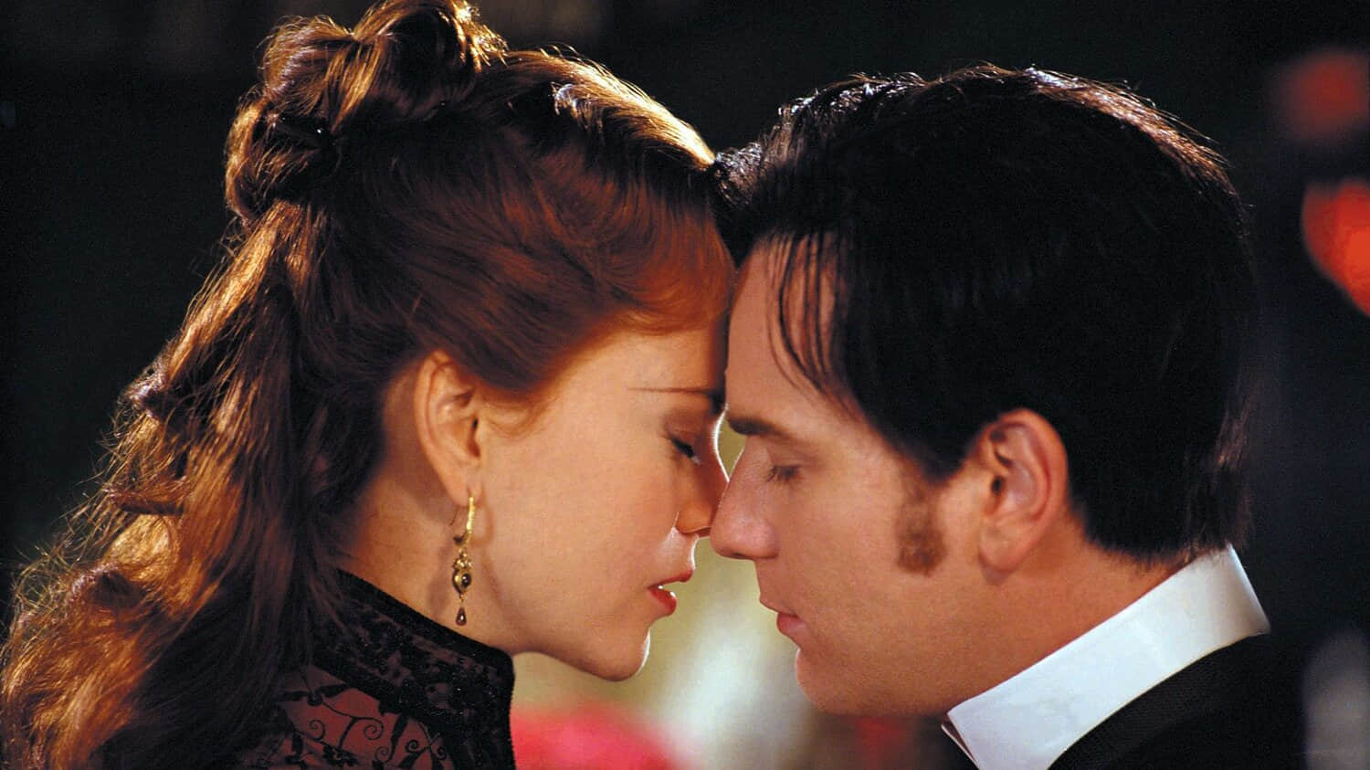 nicole-kidman-and-ewan-mcgregor-leaning-in-to-kiss-in-moulin-rouge.jpeg