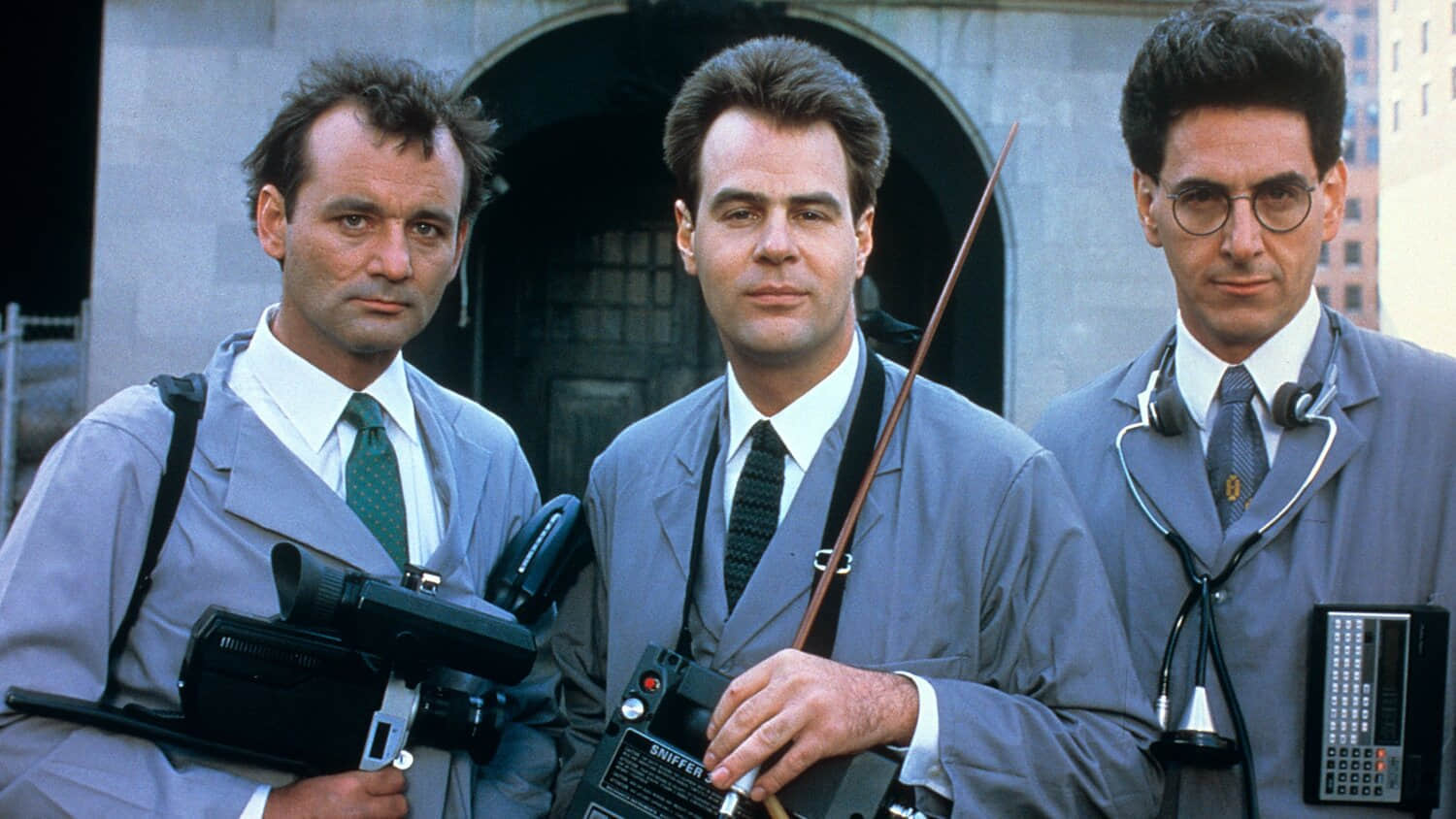 bill-murray-dan-aykroyd-harold-ramis-gathered-with-their-equipment-in-ghostbusters.jpeg