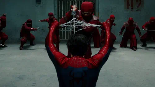 assets/spider-man-holding-a-hand-sword-with-his-webs-in-spider-man-brand-new-day.jpeg