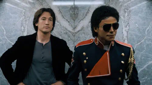 assets/miles-teller-as-john-branca-and-jaafar-jackson-as-michael-jackson-in-michael.jpeg