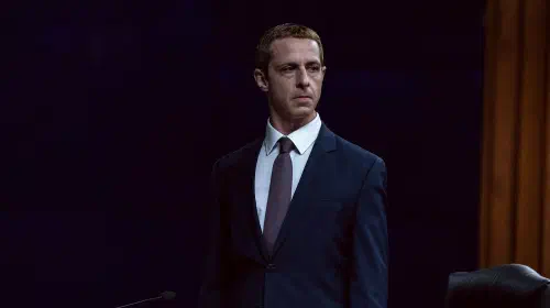 assets/jeremy-strong-s-mark-zuckerberg-looking-angrily-while-standing-up-in-the-social-reckoning.jpeg