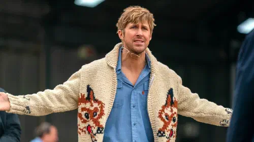 assets/ryan-gosling-as-ryland-grace-with-his-hands-up-in-project-hail-mary.jpeg