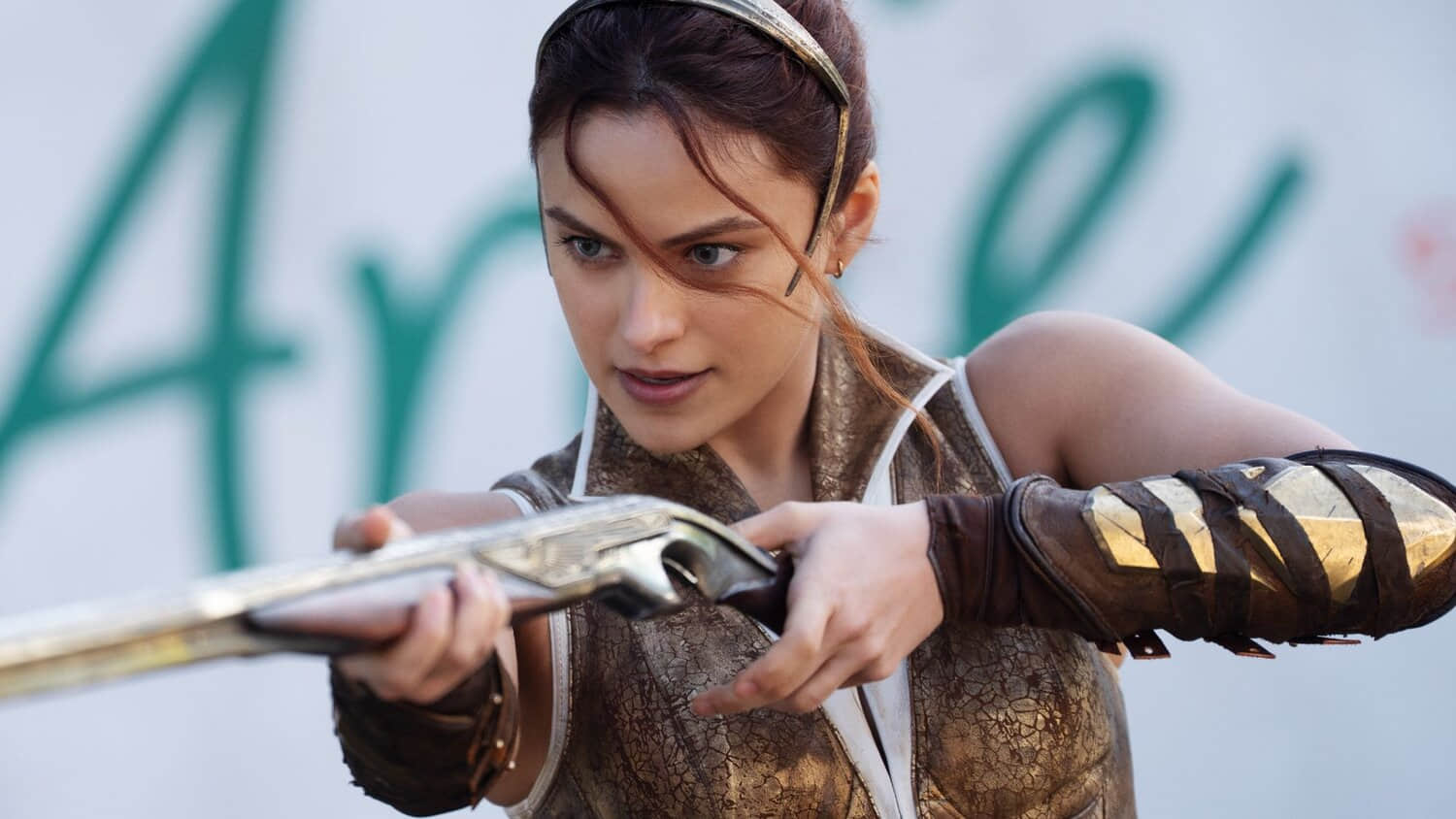 camila-mendes-brandishing-a-weapon-in-masters-of-the-universe.jpeg