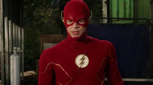assets/grant-gustin-looking-concerned-as-the-flash-in-the-arrowverse.jpeg
