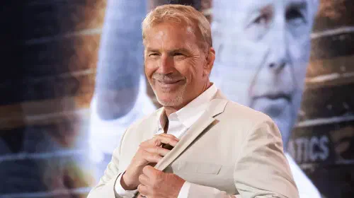 assets/kevin-costner-smiling-at-fanatics-fest.jpeg