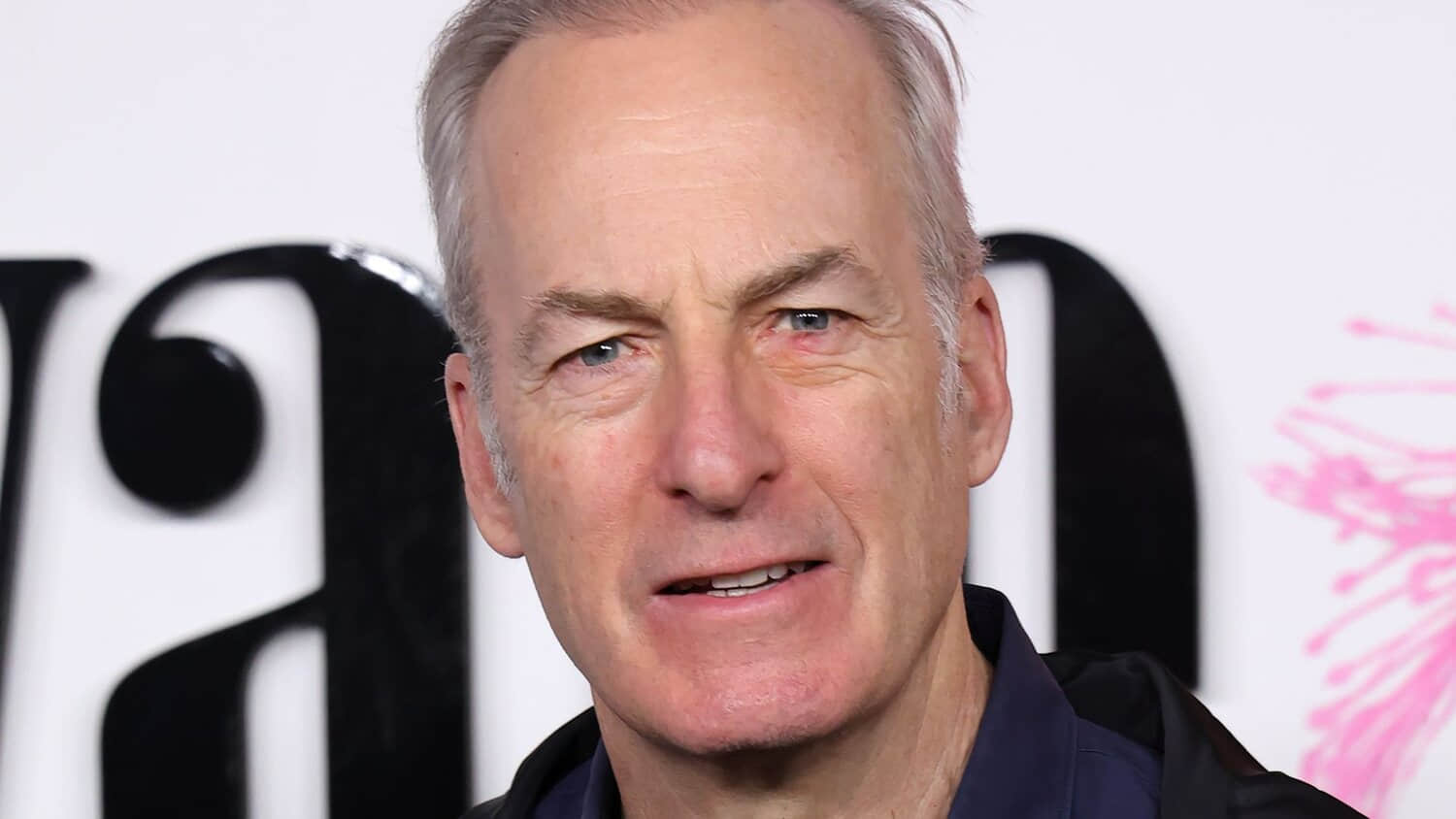 bob-odenkirk-posing-on-the-red-carpet-for-palm-royale-season-2.jpeg