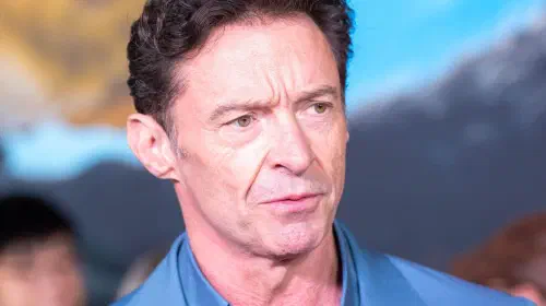 assets/hugh-jackman-frowning-slightly-on-the-red-carpet-for-the-sheep-detectives.jpeg