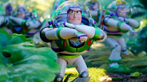 assets/buzz-lightyear-leading-a-team-of-buzzes-through-a-forest-in-toy-story-5.jpeg
