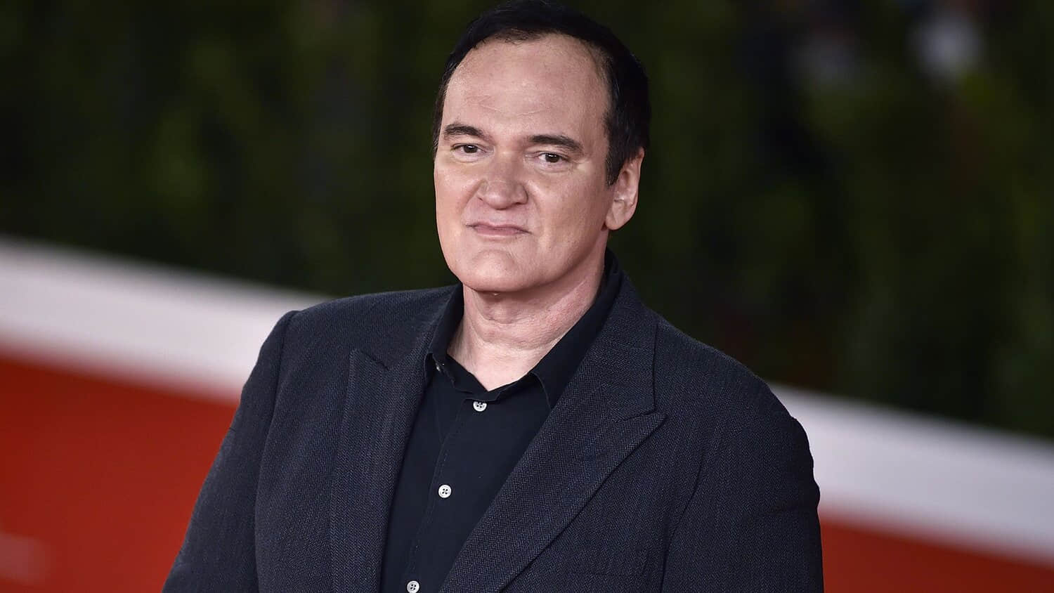 quentin-tarantino-at-a-red-carpet-event.jpeg